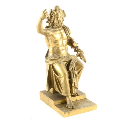 Lot 217 - A gilt metal figure of Zeus, seated, after the Antique