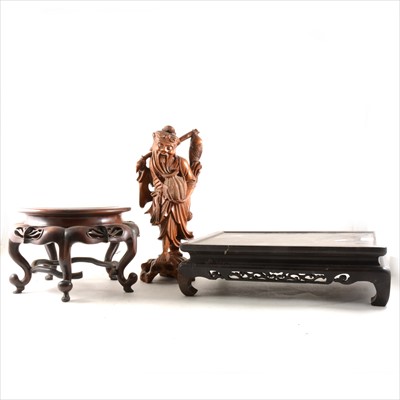 Lot 206 - A Japanese carved wooden figure of an elderly fisherman, and two carved wooden stands.