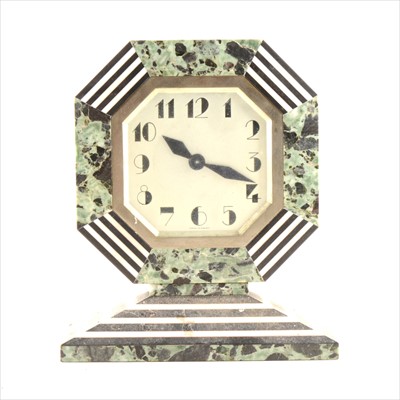 Lot 219 - A French Art Deco marble cased mantel clock