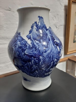 Lot 24 - A Chinese blue and white vase, a similar vase with matching cover, an two Japanese vases