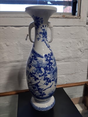 Lot 24 - A Chinese blue and white vase, a similar vase with matching cover, an two Japanese vases