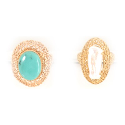 Lot 290 - A turquoise dress ring and a pearl dress ring.