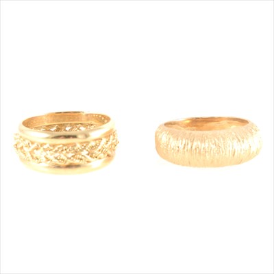 Lot 295 - Two gold / yellow metal dress rings.