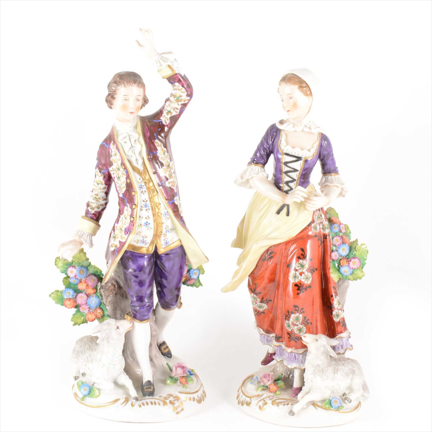 Lot 52 - A pair of large Sitzendorf figures, lady and gentleman with sheep
