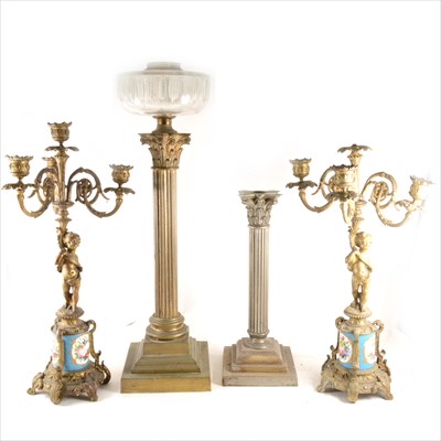 Lot 139 - A pair of French style gilt metal candelabra, and two Corinthian coloumn lamp bases