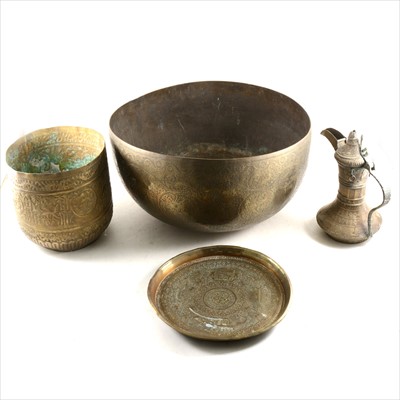 Lot 132 - An Indian engraved brass circular basin, and other Eastern metal ware
