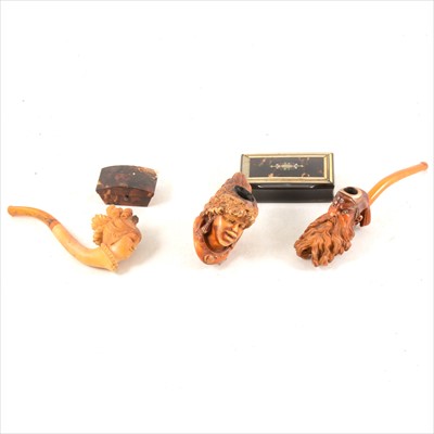 Lot 252 - Three figural smoking pipes, and two small tortoiseshell boxes