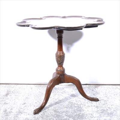 Lot 441 - A reproduction mahogany pedestal table, lobed tilt-top