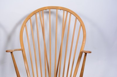 Lot 10 - Three Ercol armchairs and similar rocking chair