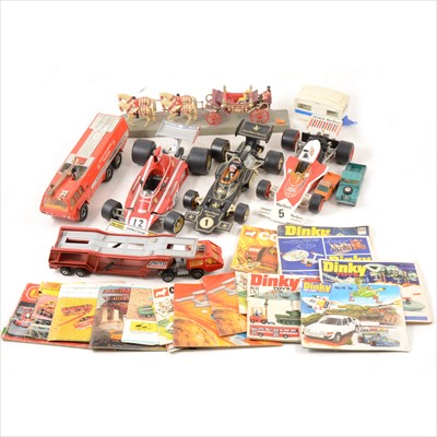Lot 200 - Corgi and others die-cast models and vehicles; including Airport crash truck, Coronation coach, F1 cars, and a selection of Dinky, Corgi and Matchbox catalogues, three trays.
