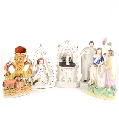 Lot 72 - A collection of nine Staffordshire figures and groups.