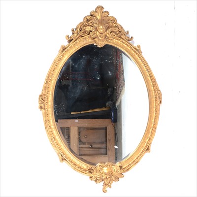 Lot 402 - A large gilt painted wall mirror