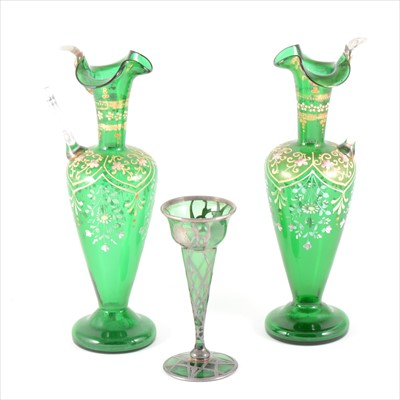 Lot 61 - Pair of Victorian green glass jugs with floral decoration,....