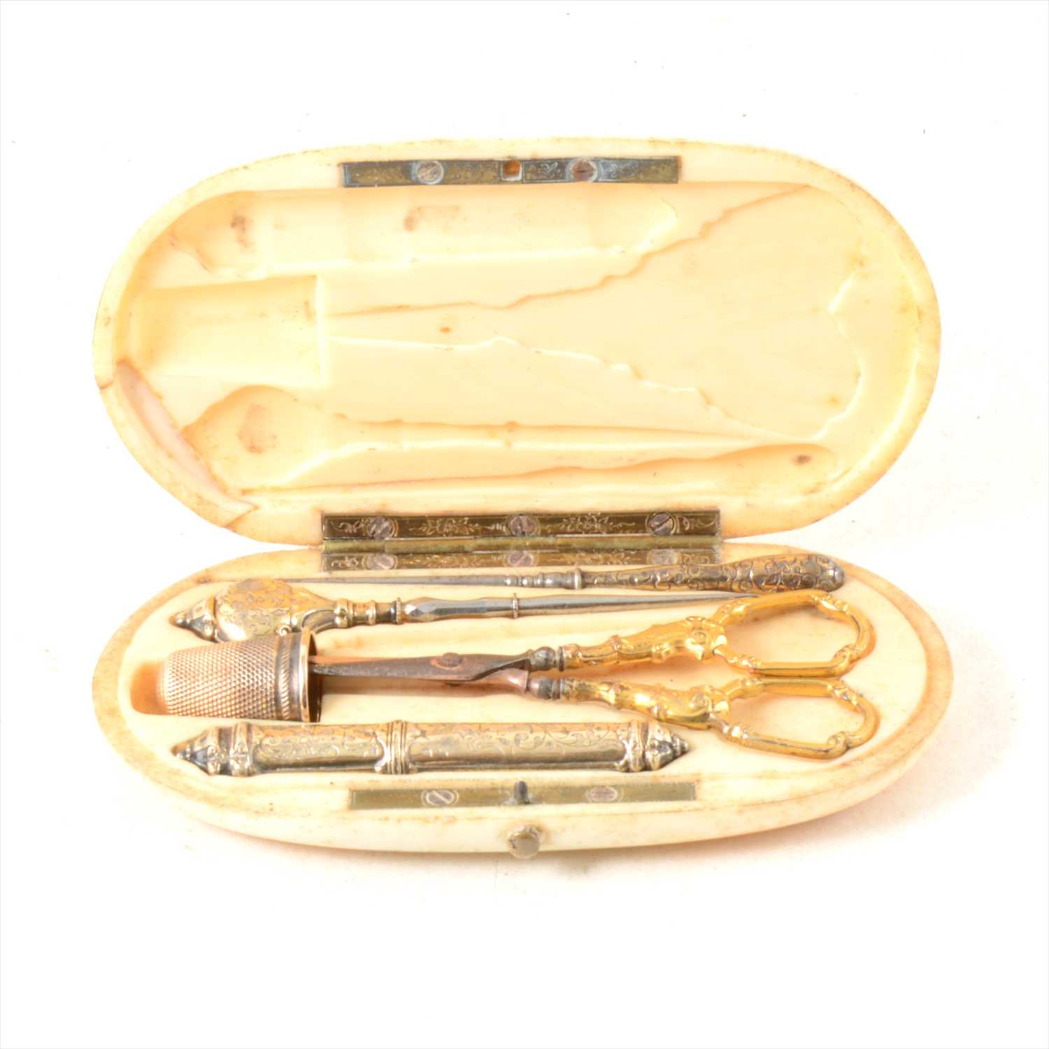 Lot 144 - Ivory cased French gilt metal etui set