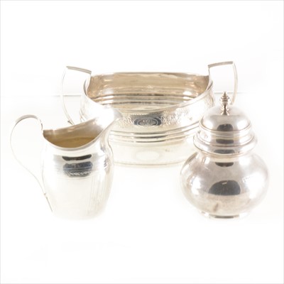 Lot 245 - A silver sugar bowl, cream jug and lidded jar.