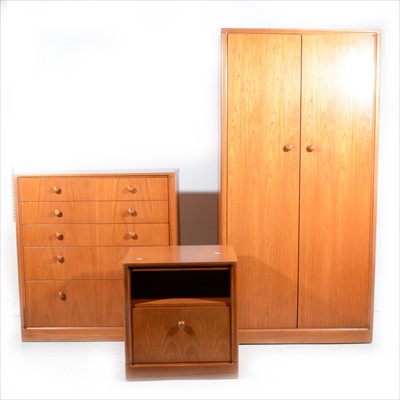 Lot 470 - A three-piece teak finish bedroom suite, labelled Merrydew Avalon