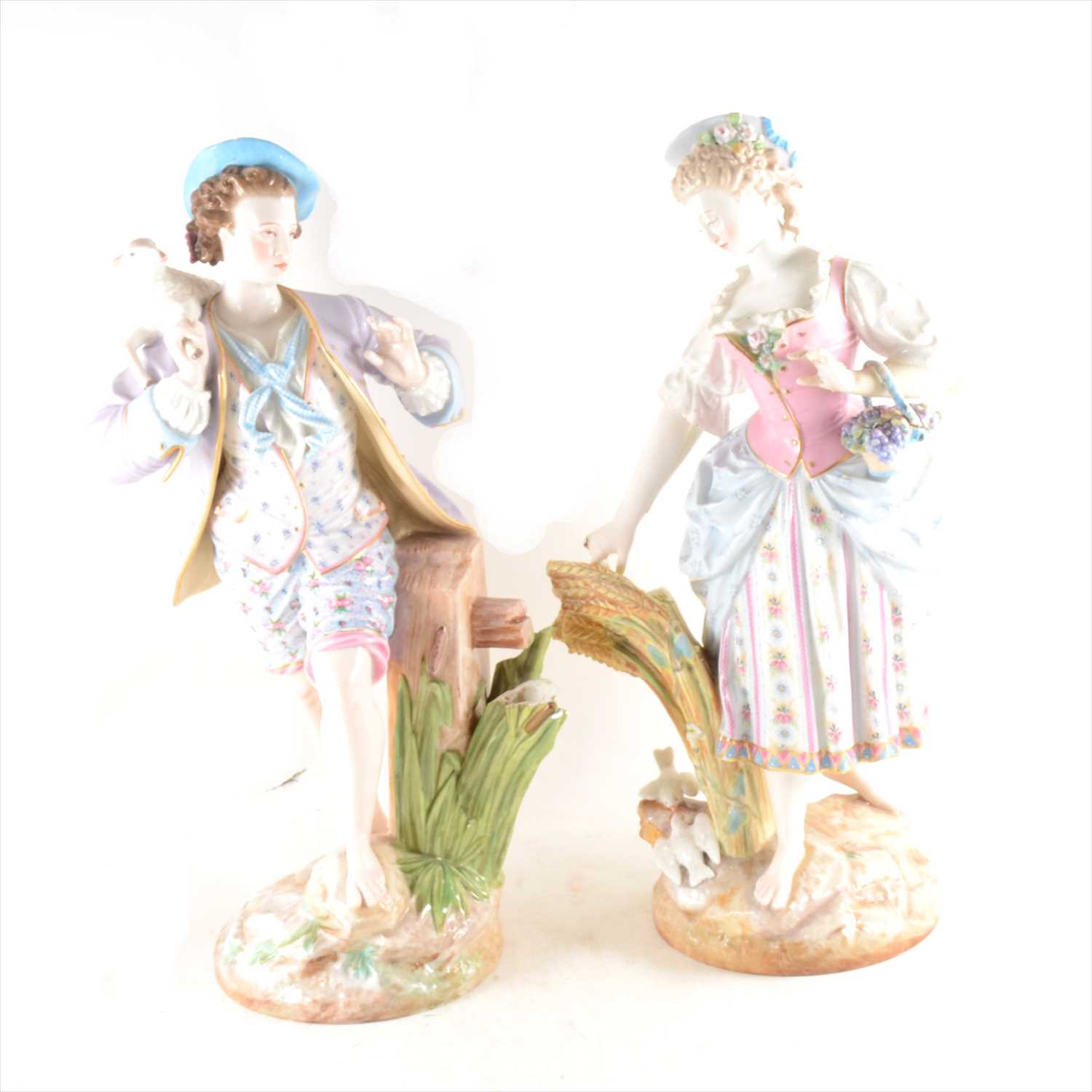 Lot 8 - Pair of German porcelain figures of a shepherd boy and country girl (damaged), 43cm.
