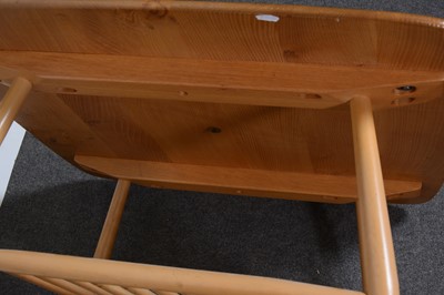Lot 8 - An Ercol coffee table with magazine undertier