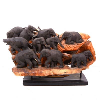 Lot 375 - A large Malaysian carved and stained teak elephant family group