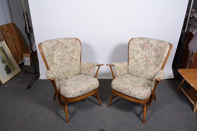 Lot 11 - A pair of Ercol elbow chairs