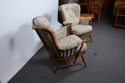 Lot 11 - A pair of Ercol elbow chairs