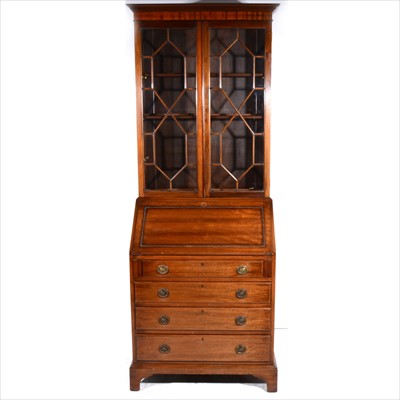 Lot 311 - A stained walnut bureau bookcase