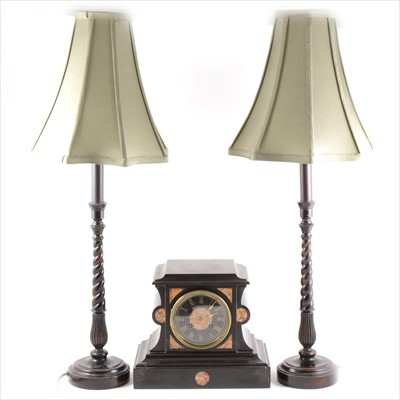 Lot 173 - French black marble and inlaid mantel clock, and pair of wooden table lamps