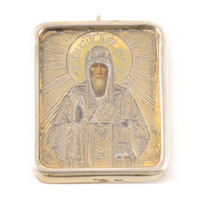 Lot 324 - A small Russian silver-covered icon of Saint Alexei of Moscow