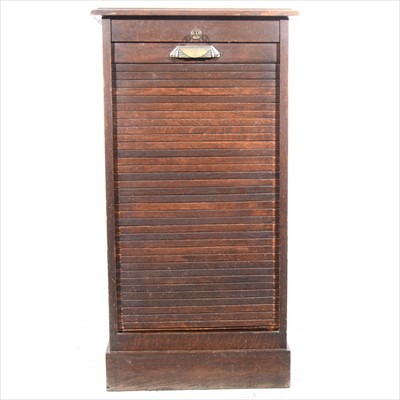 Lot 333 - An oak filing cabinet