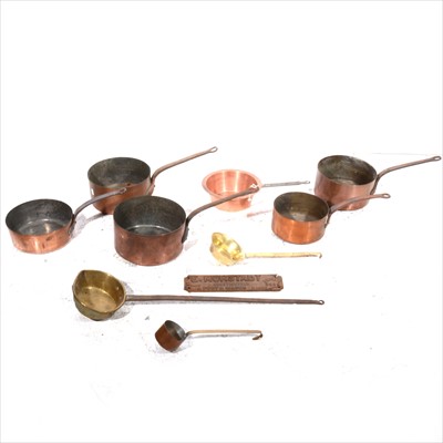 Lot 131 - A collection of copper pans, etc