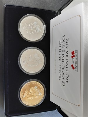 Lot 182 - Three £5 silver coin proof sets from the Jubilee Mint, and a 100th anniversary of the The House of Windsor silver proof £1 coin collection, cased.