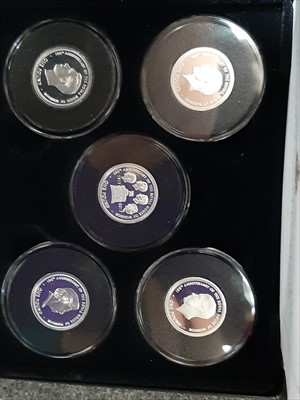 Lot 182 - Three £5 silver coin proof sets from the Jubilee Mint, and a 100th anniversary of the The House of Windsor silver proof £1 coin collection, cased.