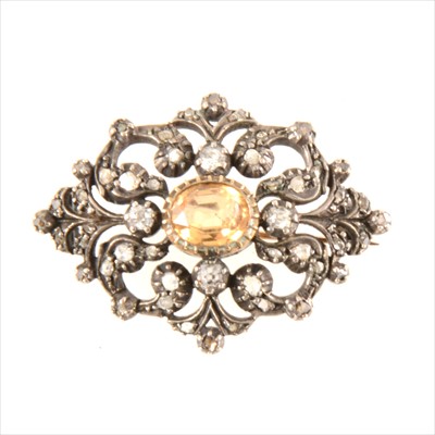 Lot 232 - A late Victorian diamond brooch with golden yellow stone to centre.