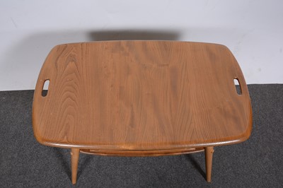 Lot 6 - An Ercol  two-tier tray table