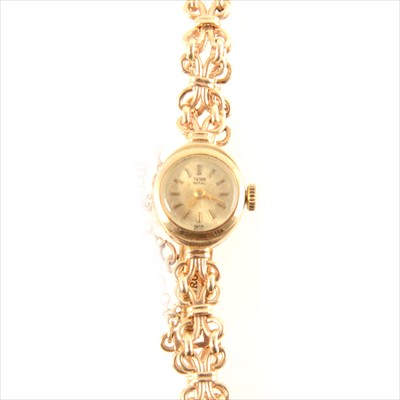 Lot 257 - Tudor - a lady's 9 carat yellow gold bracelet watch.