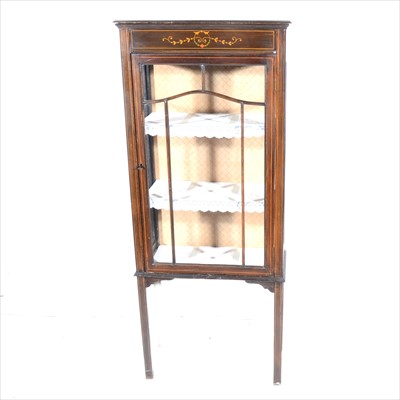 Lot 448 - An Edwardian stained wood display cabinet