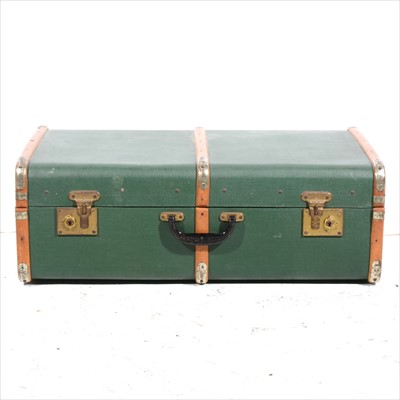 Lot 335 - A green cloth suitcase, wood banded.