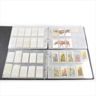 Lot 154 - One box of cigarette cards, 51 sets. and spare binders, TBA