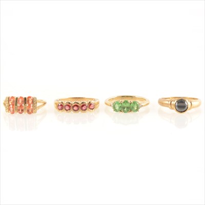 Lot 211 - Four gemset dress rings, to include diamond, sapphire and tsavorite.