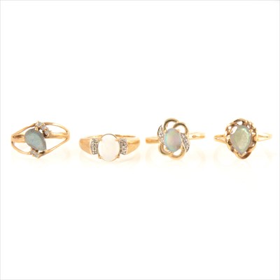 Lot 201 - Four gemset dress rings, to include opal and labradorite.
