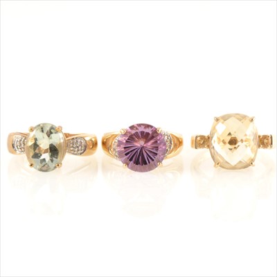 Lot 199 - Three gemset dress rings, to include amethyst and citrine.
