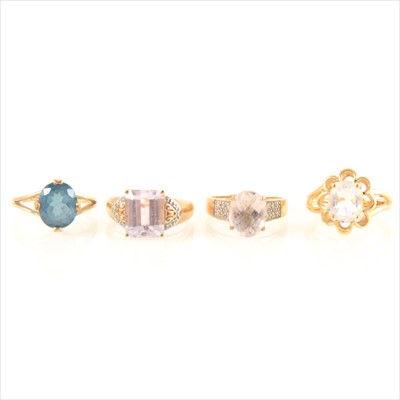 Lot 202 - Four gemset dress rings, to include aquamarine, blue topaz, kunzite and morganite.