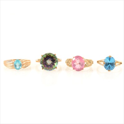 Lot 214 - Four gemset dress rings, to include topaz.