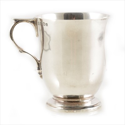 Lot 273 - A plain silver christening mug by William Comyns & Sons Ltd.