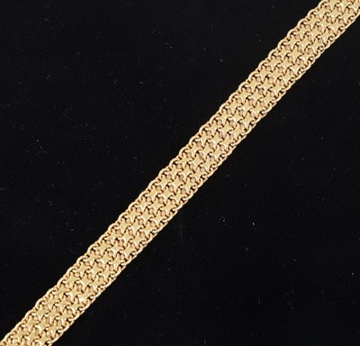 Lot 1301 - An 18 carat yellow gold bracelet.