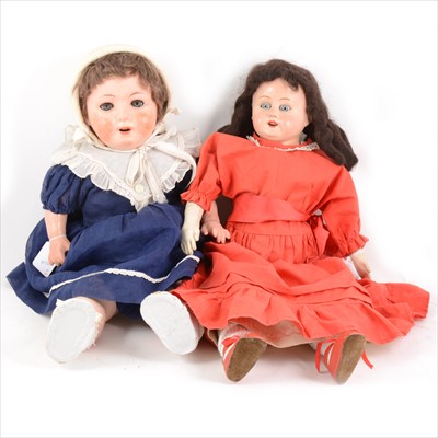 Lot 206 - Two composition dolls; both unmarked composition heads, one with leather body.