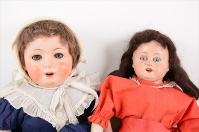 Lot 206 - Two composition dolls; both unmarked composition heads, one with leather body.