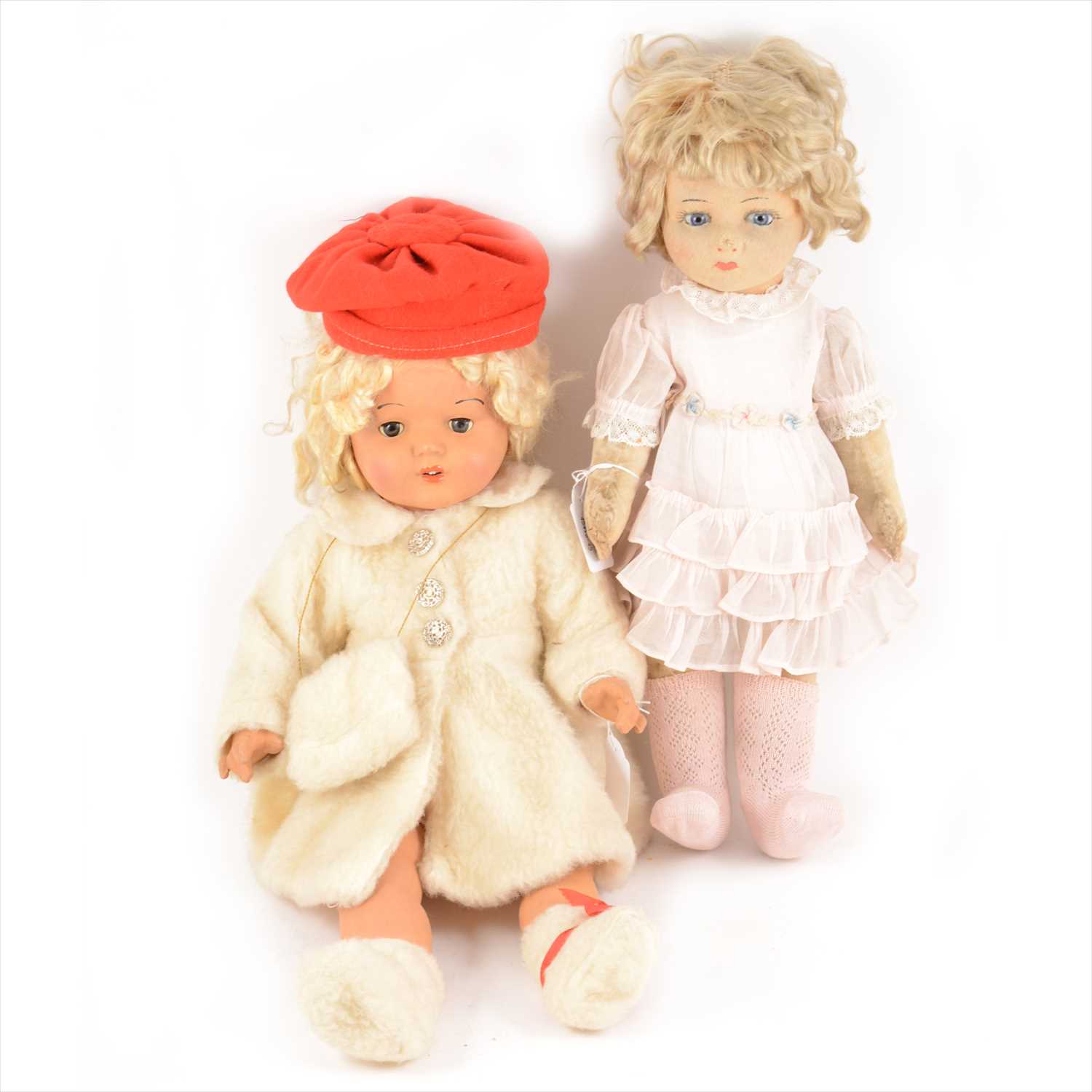 Lot 392 - Two 1930s Shirley Temple dolls; composition body and cloth body.