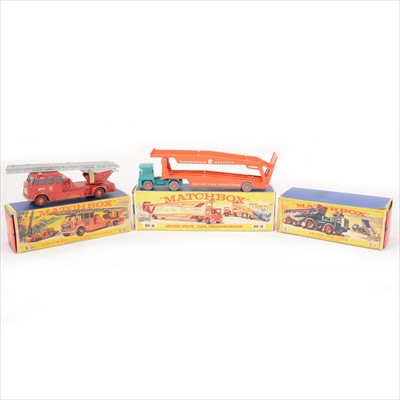 Lot 189 - Matchbox Toys; K-15 King Size Merryweather fire engine, M-8 Major Pack car transporter 'Farnborough Measham', both boxed, and a n empty box