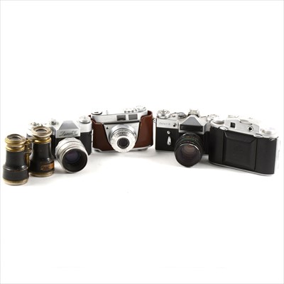 Lot 101 - A box of assorted cameras - Zenet-E, Zenet 3M etc